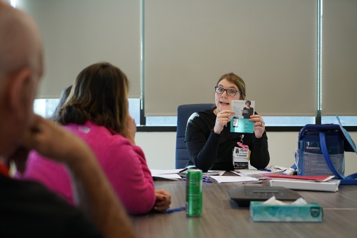 Instructor Mackenzie Ross leads a group of patients attending the Total Joint Class prior to surgery.