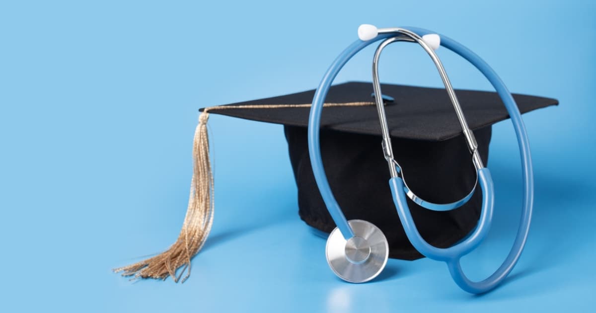 Graduate cap and blue stethoscope