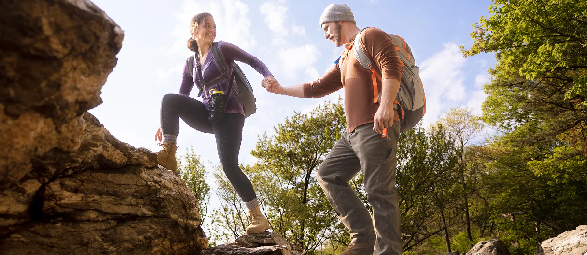 Male and female couple hiking in the mountains