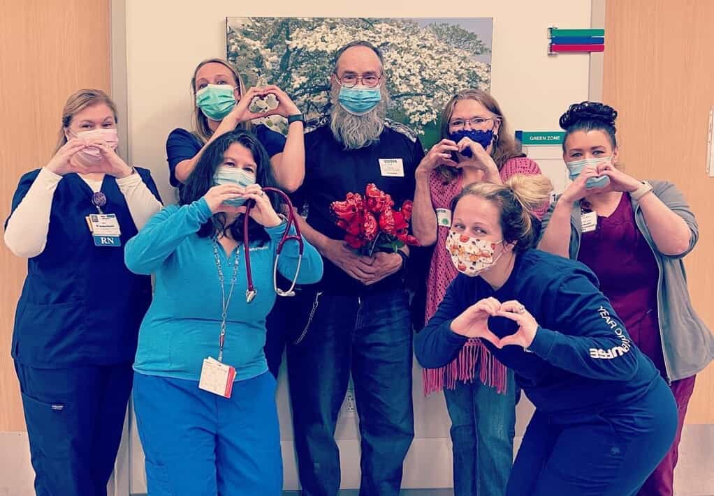 Charles Coby with medical staff