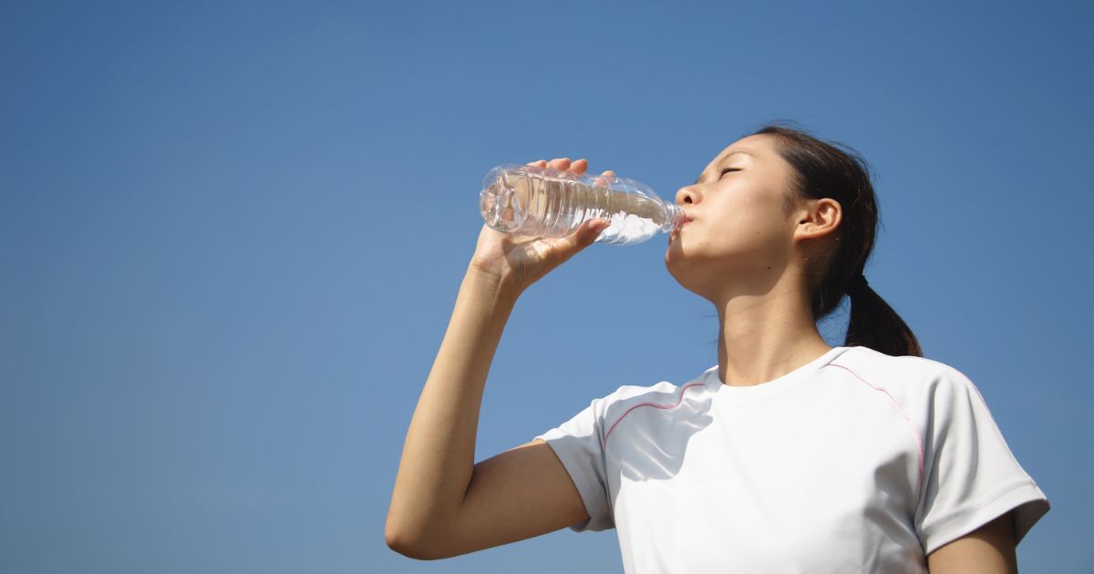 woman drinking water;