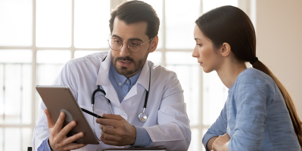 Doctor talking to patient