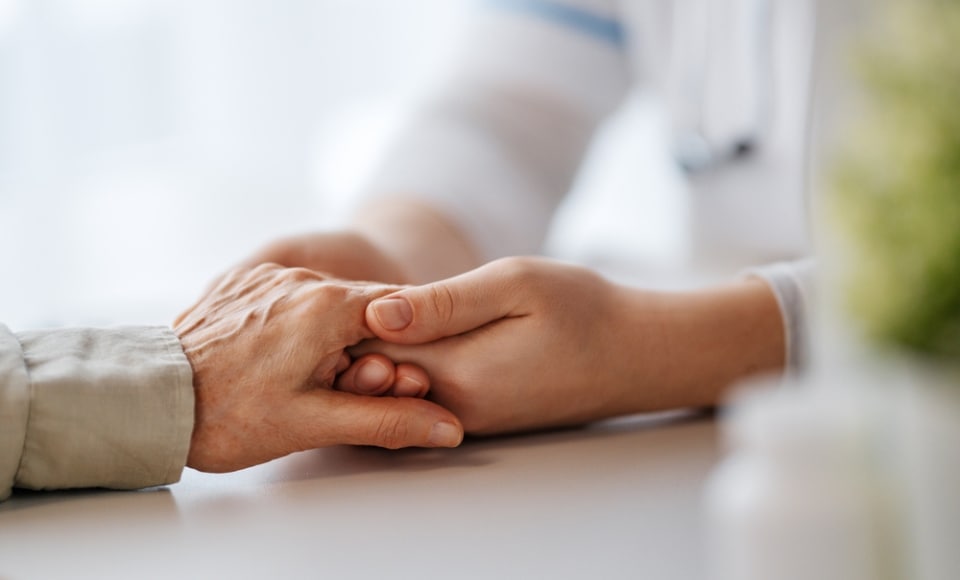 image of two hands holding