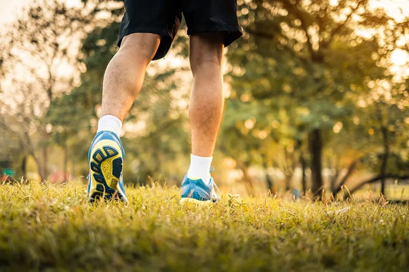Close up of legs with shorts and sneakers