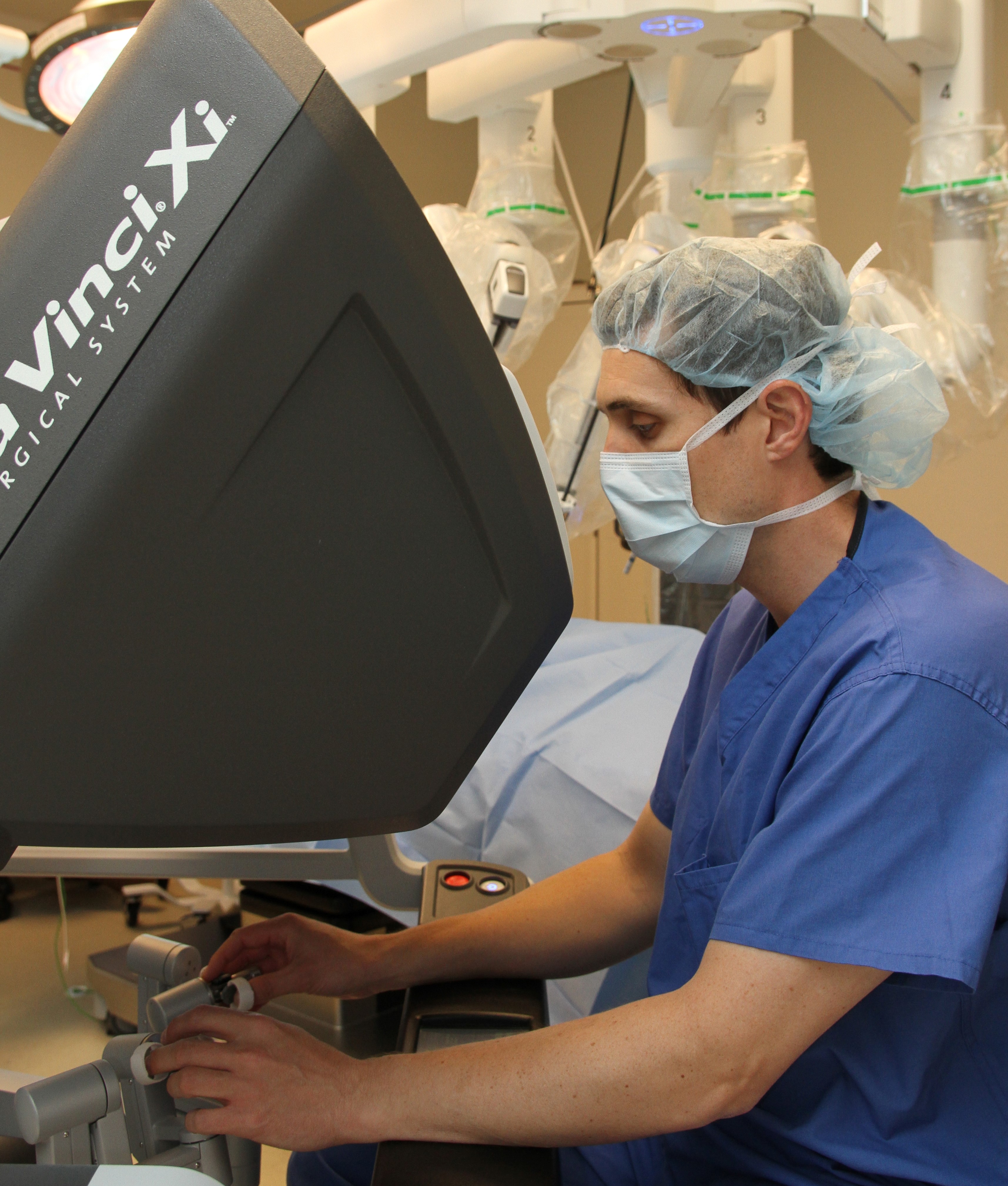 physician using robotic surgery tool
