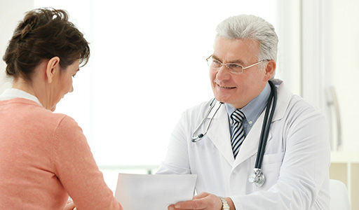 Physician listening to patient's heart