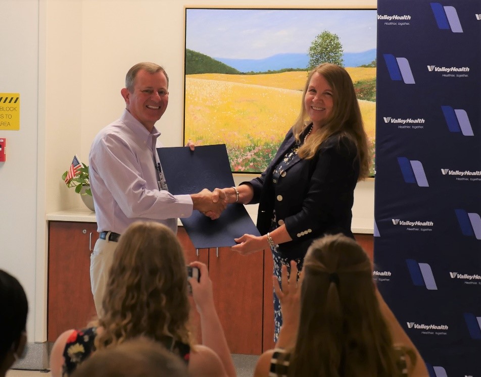 Two people shaking hands