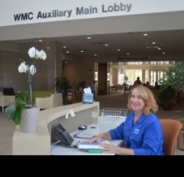 Volunteer in the lobby of Cancer Center
