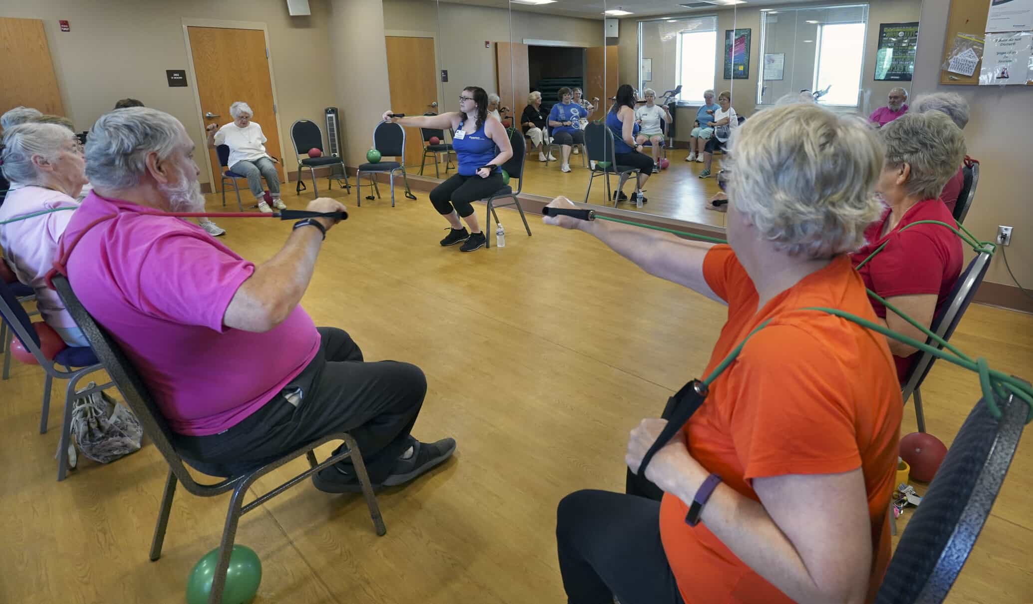 Photo of group of people exercising together