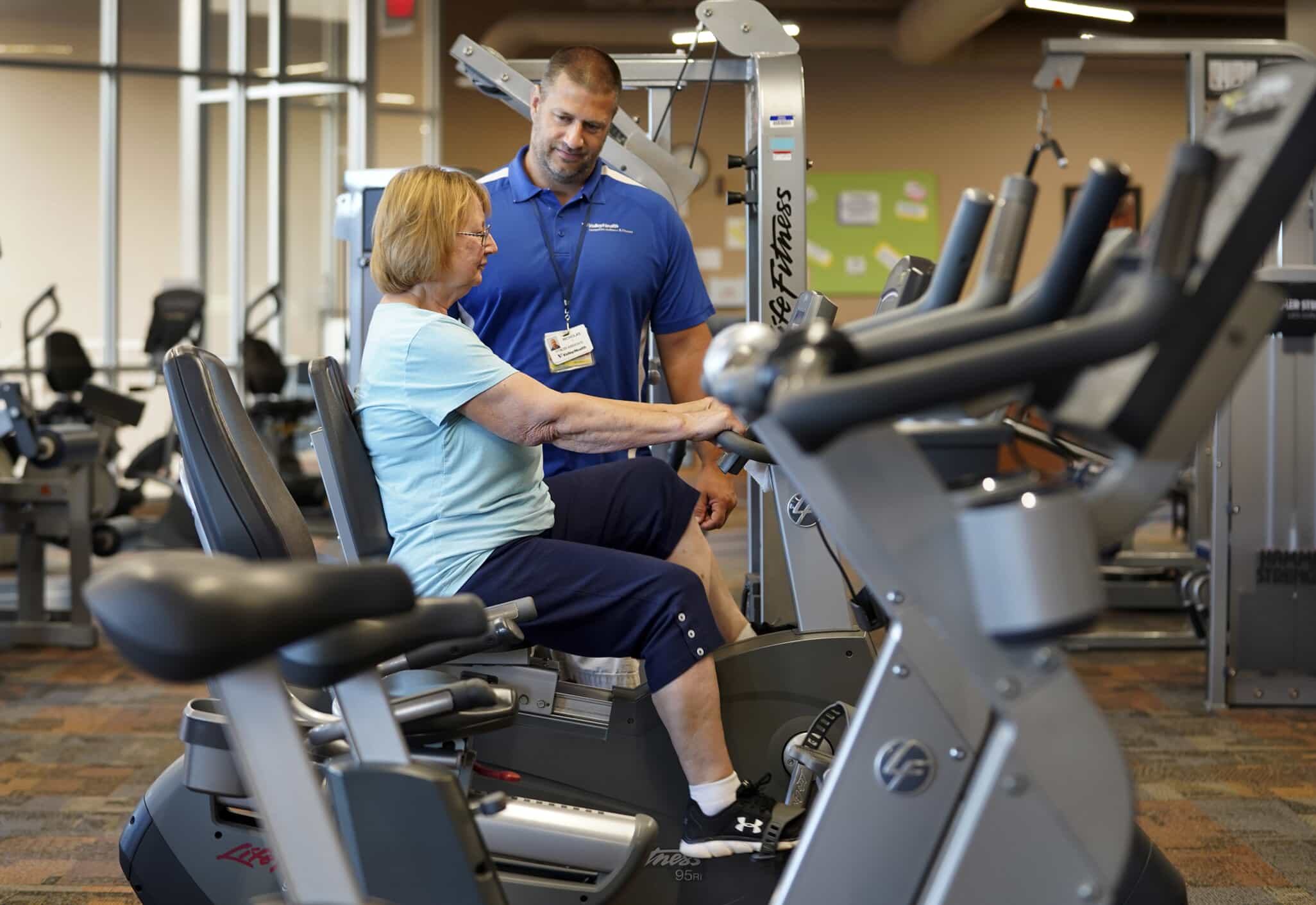 Photo of woman with personal trainer