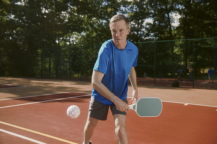 man playing pickleball