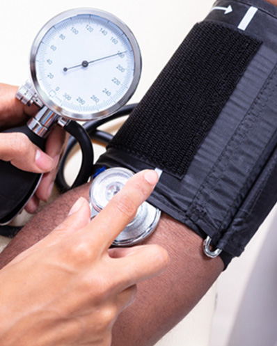 person getting blood pressure measured